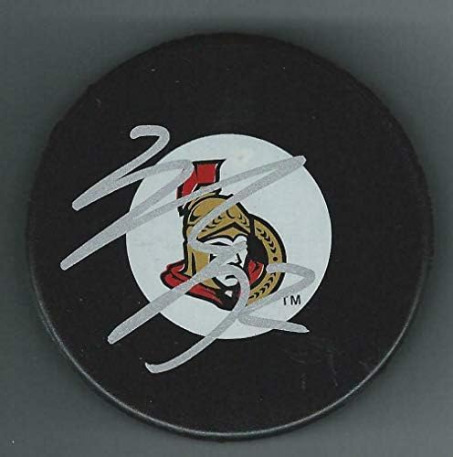 Dylan DeMelo a semnat pucul Ottawa Senators-pucuri NHL cu autograf